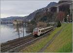 The new SBB Flirt RABe 523 107 on the way to Bex near the Castle of Chillon.