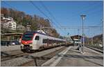 The SBB Flirt3 RABe 523 107 on the way to Palézieux by his stop in Puidoux.