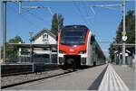 The SBB RABe 523 114 (Flirt3) by his stop in Burier.