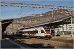 Two SBB Flirts RABe 523 are leaving Vevey.