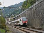 The SBB RABe 523 305 and an 'Mouettes' are leaving the Veytauyx-Chillon Station. 

03.10.2025