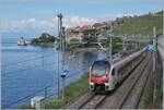 Two SBB RABe 523 are on their way towards Lausanne near St-Saphorin. In the background, Rivaz and a CGN paddle steamer can be seen.

May 28, 2024