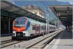 The SBB TILO RABe 524 301 by his stop in Bellinzona.