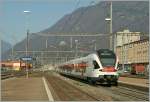 A TILO Service to Castione Arbedo is leaving Giubiasco. 
23.03.2011