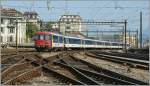 A RBe 540 with a rush-hour Train to St-Marice is leaving Lausannne.