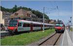 Region Alps local trains on te way to Brig and St Gingolph by his crossing in Bouveret.