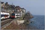 A SBB RBDe 560  Domino  on the way to Lausanne by St-Saphorin.

06.02.2018