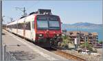 The Region Alpes regional train R91 6125 is waiting in Saint Gingolph for departure (15:51) to Brig (arrival 17:56). In service for this route is an SBB Domino with the ABt NPZ Do 50 85 39-43 814-5 CH-SBB at the front, the B NPZ Do 50 85 29-43 150-6  ...