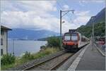 Close to the border with France, in Saint Gingolph (Switzerland), the Region Alpes RBDe 560 011 Domino is waiting for the return trip to Brig.