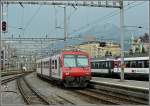 A local train to Langenthal is leaving the station of Luzern on July 30th, 2008.