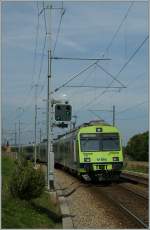The BLS  S3  to Biel/Bienne is leaving Kehrstatz Nord.
05.10.2012