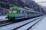 BLS 741 stands in Kandersteg on 31 December 2018 -despite it being about Noon, the photo is rather dark due to the fact, that Kandersteg station lies almost entirely in the shadows of the adjacent