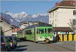 The ASD BDe 4/4 404 wiht his Bt by a stop at Aigle Place du Marché ASD.