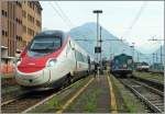 The EC 323 on the way to Roh Fiera Milano is leaving Domodossola.
