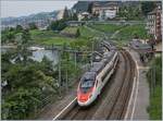 A SBB ETR 610 from Milan to Geneva by the Veytau Chillon Station.