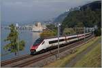 A SBB ETR 610 from Milano to Geneva by the Castle of Chillon.