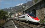 The SBB ETR 610 to Milano by the Veytaux-Chillon Station.