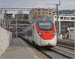 The SBB Giruno RABe 501 023 coming from Zürich is arriving at Lugano.