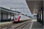 The SBB IC200 RABDe 502 008-1 (UIC 94 85 0 502 008-1 CH-SBB)  Lausanne Capitale Olymique  on a test-run in Prilly-Malley. 

17.07.2020