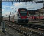 In the evening light is arriving the SBB 511 101 at the Lausanne Station.