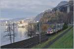 The SBB RABe 511 020 on the way to St Maurice near Villeneuve by the Castle of Chillon.