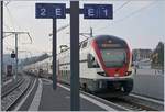 The SBB RABe 511 030 is leaving Lancy-Pont-Rouge on the way to Annemasse.