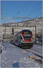 The SBB RABe 511 114 is leaving Vevey on the way to Geneva.