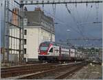 The SBB RABe 511 is leaving Lausanne.