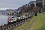 The SBB RABe 511 038 on the way to Annemasse by the Castle of Chillon.