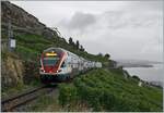 The SBB RABe 511 027 on the way to Geneva Airport on the vineyard line (work on the line via Cully).