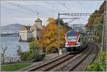The SBB RABe 511 121 by the Castle of Chillon on they way to Annemasse.