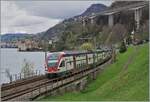 The SBB RABe 511 030 travels along the turbulent Lake Geneva near Villeneuve towards Saint Maurice.