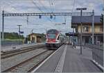 The SBB RABe 511 106 is RE 33 on the journey from Annemasse to St-Maurice and passes without stopping through the beautifully renovated station of Roche (VD).

September 2, 2026