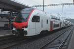 SBB newby 512 022 calls at Brugg AG on a rainy 22 June 2024.
