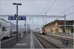On the plattform 1 in Bex is arriving the RE 33 from Annemasse to St Maurice. In theis service is running a SBB RABe 512. 

19.01.2026