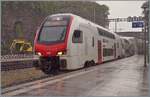 During a heavy rain shower, an SBB RABe 512 as R2 to Grandson arrives at Vevey station.

August 17, 2026