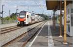 The R2 24226 from Bex to Grandson, led by an SBB RABe 512, is leaving Roche VD station.

September 2, 2026