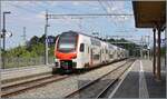 An SBB RABe 512 departs from Roche VD station as R1 from Bex to Grandson.