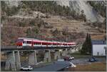 Two TMR Region Alps RABe 525  NINA  are traveling from Le Châble to Martigny and are crossing the Sembrancher Bridge, which leads directly into the Sembrancher station. 

21 Jan 2026