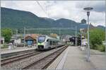 The BLS MIKA RABe 528 134 is operating as IR 1868 on the journey from Basel SBB to Biel/Bienne and is leaving the BLS 7 MLB station of Grenchen Nord.  
In the background, the Jura mountain range with the Wandfluh in the center of the image.

May 20, 2026