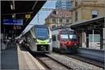 The BLS MIKA RABe 528 is in Neuchâtel as IR 66 on its way from La Chaux de Fonds to Bern, while to the right of it an SBB Domino was waiting to depart for Buttes.

July 11, 2026