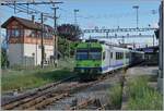 The BLS RBDe 565 237 in Kerzers on the way form Bern to Lyss.