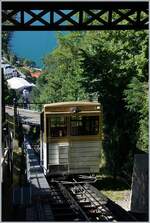 Car 1 of the Territet Glion funicular reaches its destination. The view down to the lake shows the height difference the funicular overcomes.

July 3, 2016