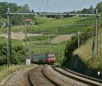 Re 460 089-6 with IC to St Gallen between Bossiere and Grandvaux.