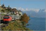 SBB Re 460 013-6 with an IR by St Saphorin.