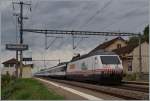 The SBB Re 460 063-9 with his IR to Luzern in Grandvaux.