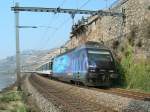 SBB Re 460 051-6 with an IR service to Brig by St-Saphorin.