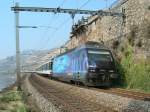 SBB Re 460 051-6 with an IR service to Brig by St-Saphorin.