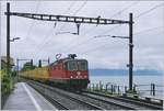 The SBB Re 420 263-6 wiht a mail-service on the way to Lausanne by St Saphorin.