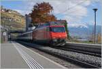 A SBB Re 460 with an IR90 on the way to Lausanne by Rivaz.